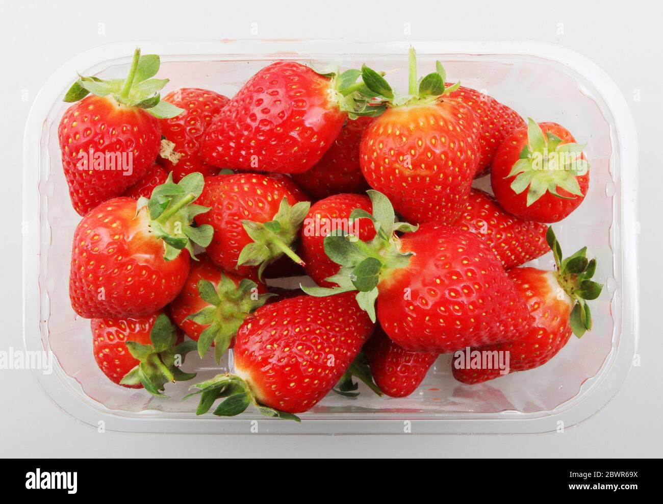 Strawberry fruit isolated on white. Strawberries are actually a group
