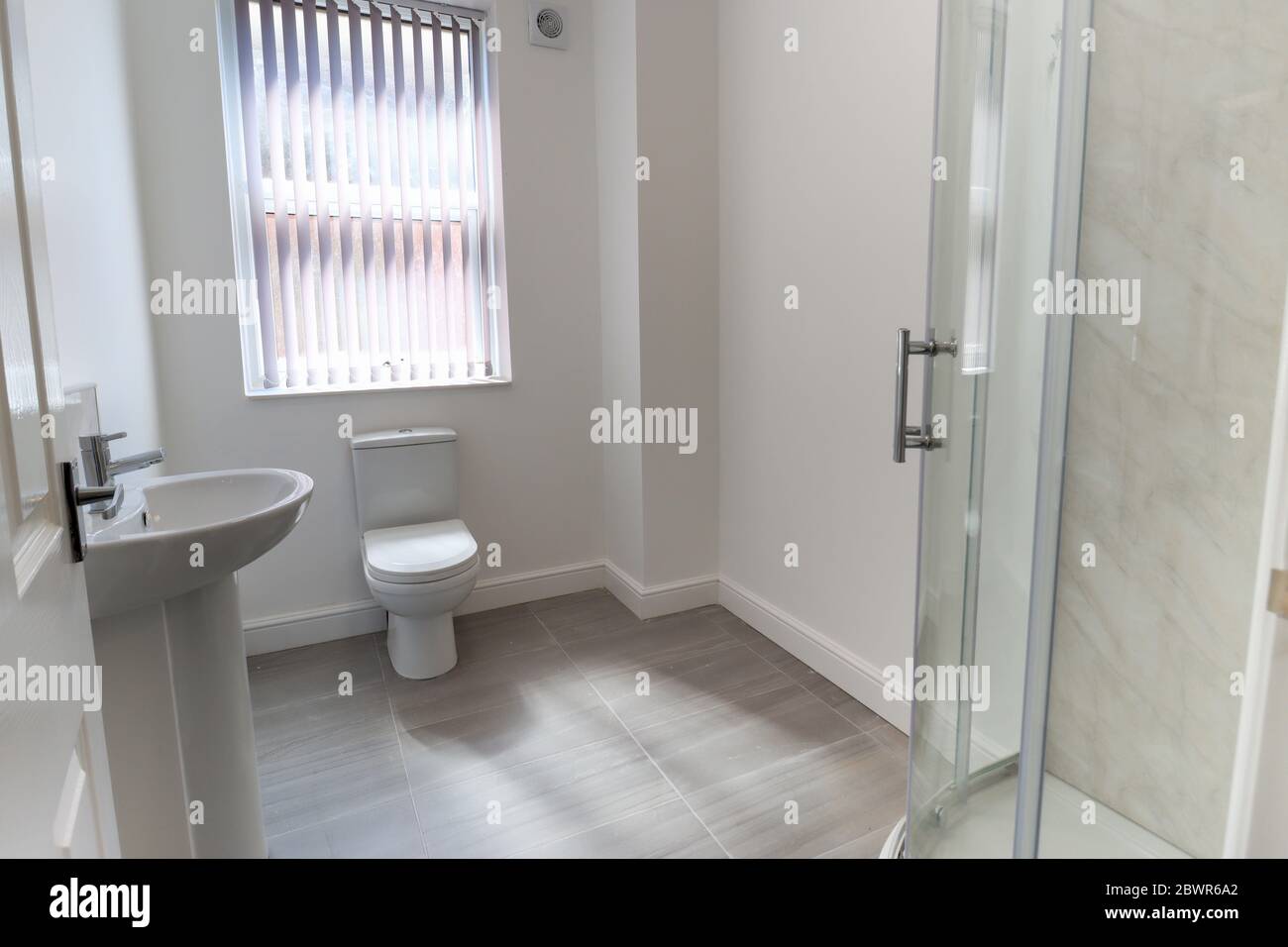 Photo of a modern brand new British bathroom showing a newly installed