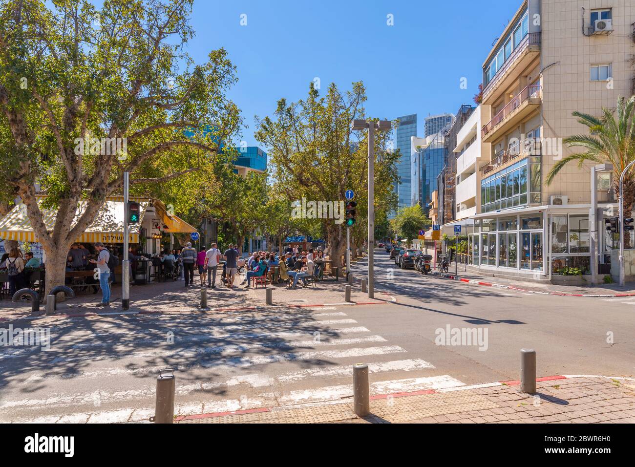 View of cafe and buildings on Rothschild Boulevard, Tel Aviv, Israel, Middle East Stock Photo