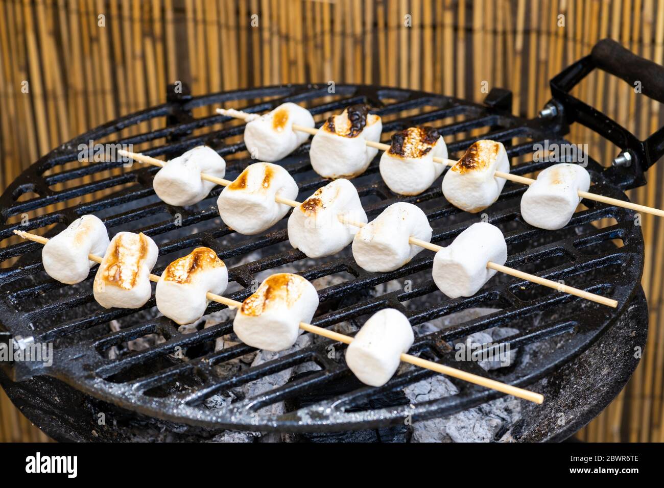 grilled skewers of marshmallow as dessert Stock Photo - Alamy