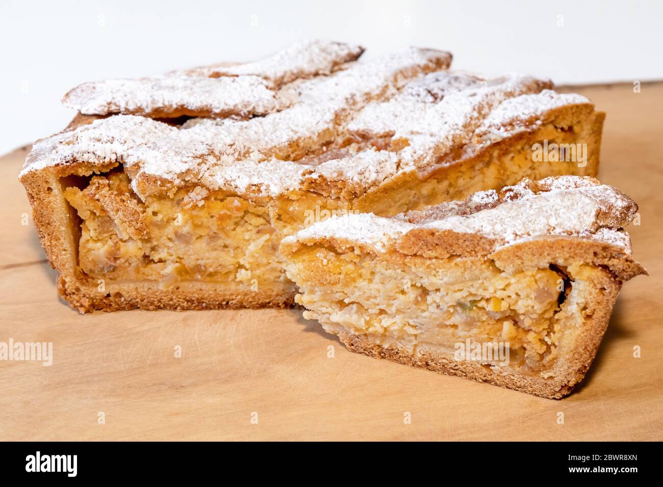 Neapolitan Pastiera, typical Italian dessert. Type of tart typical of the  Easter festival, filled with ricotta and candied fruit, covered with Stock  Photo - Alamy