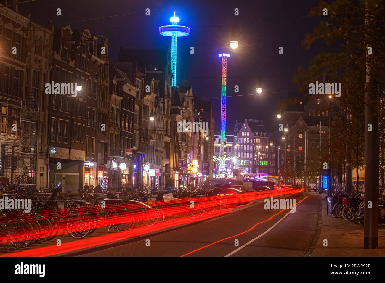Street scene (Damstraat) at night, Amsterdam, North Holland, Netherlands. Stock Photo