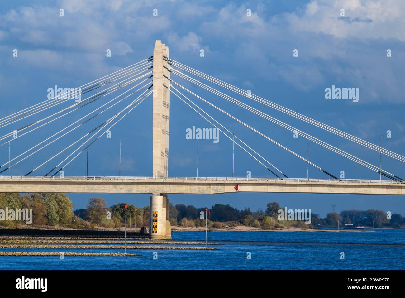 Ewijk-bridge - a suspension bridge over the Waal River, Ewijk, Gelderland, Netherlands. Stock Photo