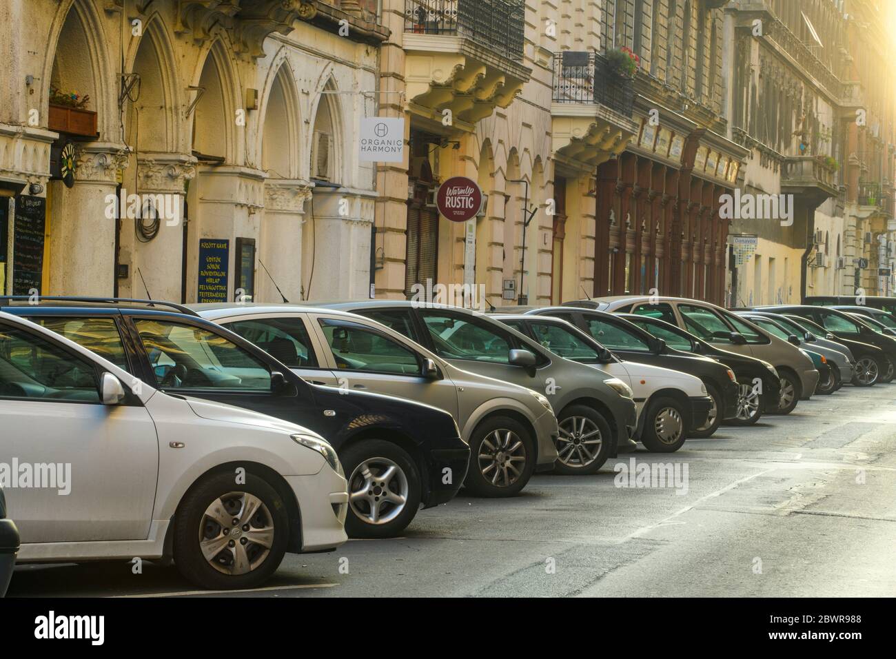 Downtown Budapest (Pest)- Vehicles parked on Liszt Ferenc Ter sidestreet, Budapest, Central Hungary, Hungary. Stock Photo