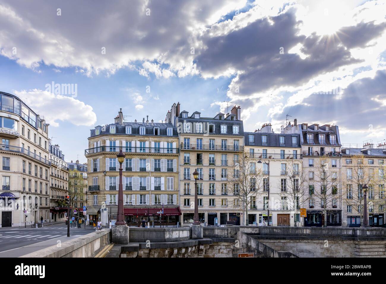 Paris, France - April 9, 2020: Typical Haussmannian buildings near La Tour D'Argent restaurant during containment due to covid-19 Stock Photo