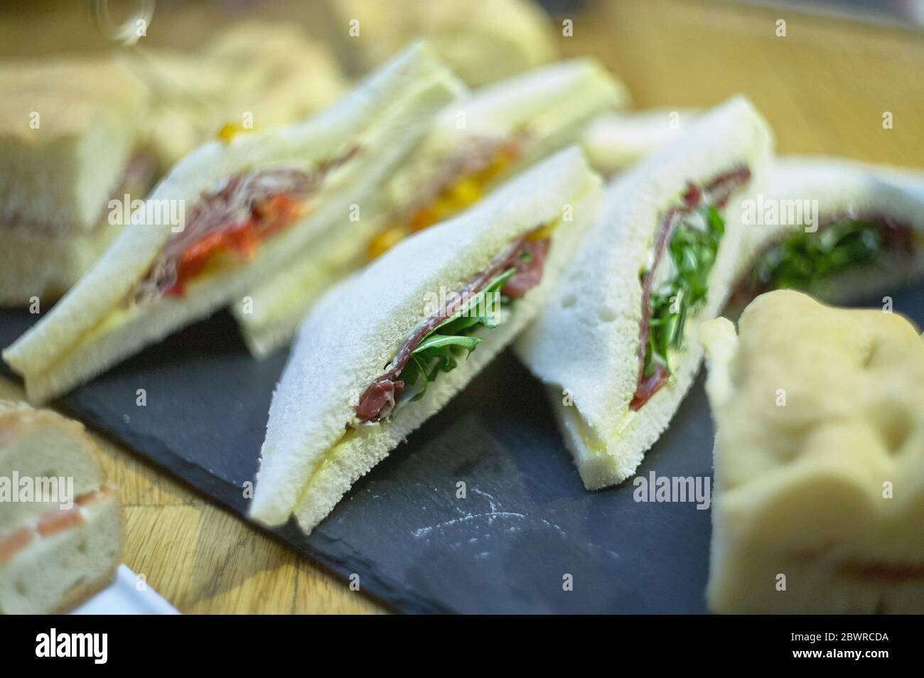 Buffet full of sandwiches Stock Photo - Alamy