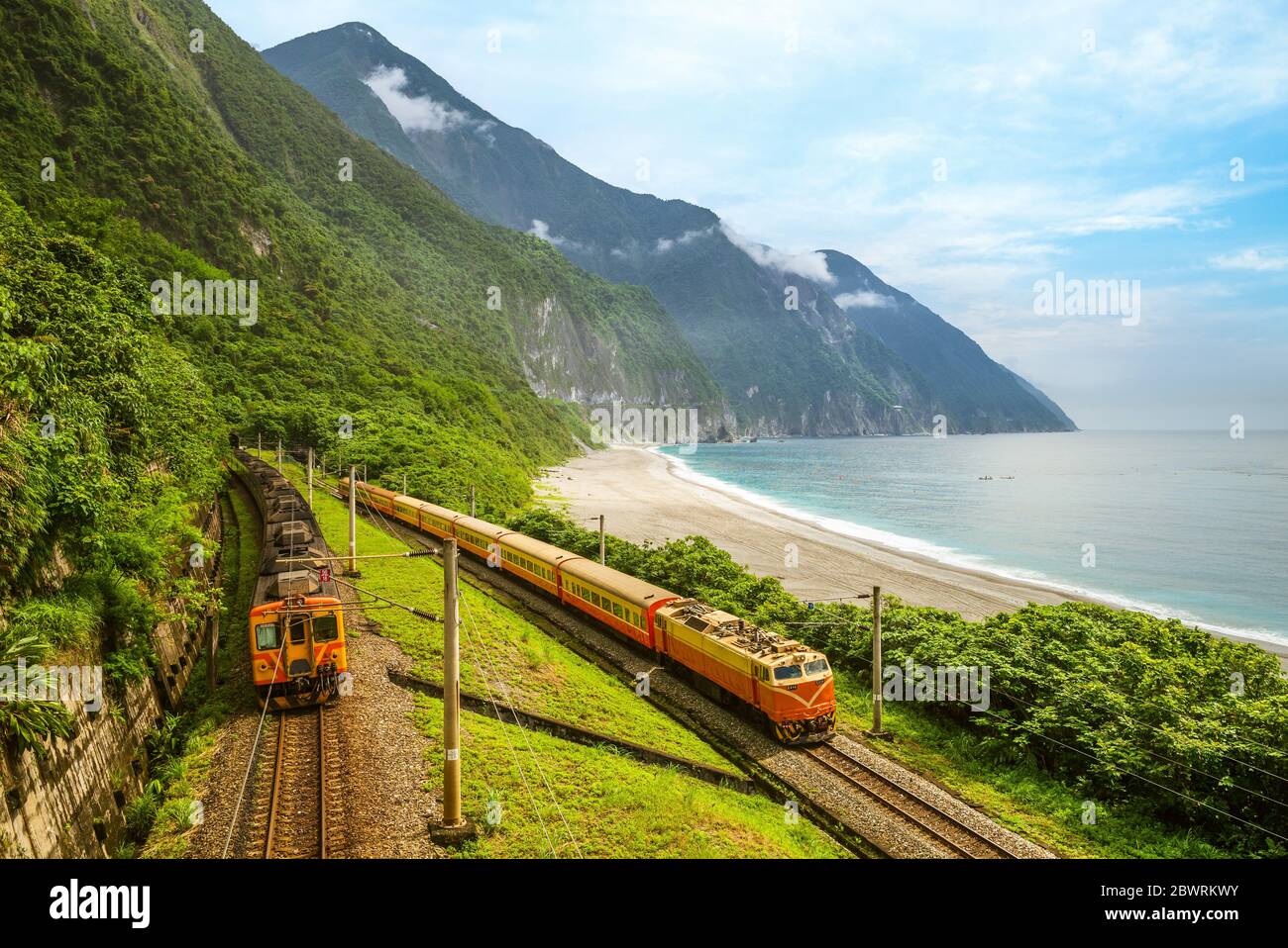 Trains at eastern coastline near qingshui cliff, hualien, taiwan Stock Photo