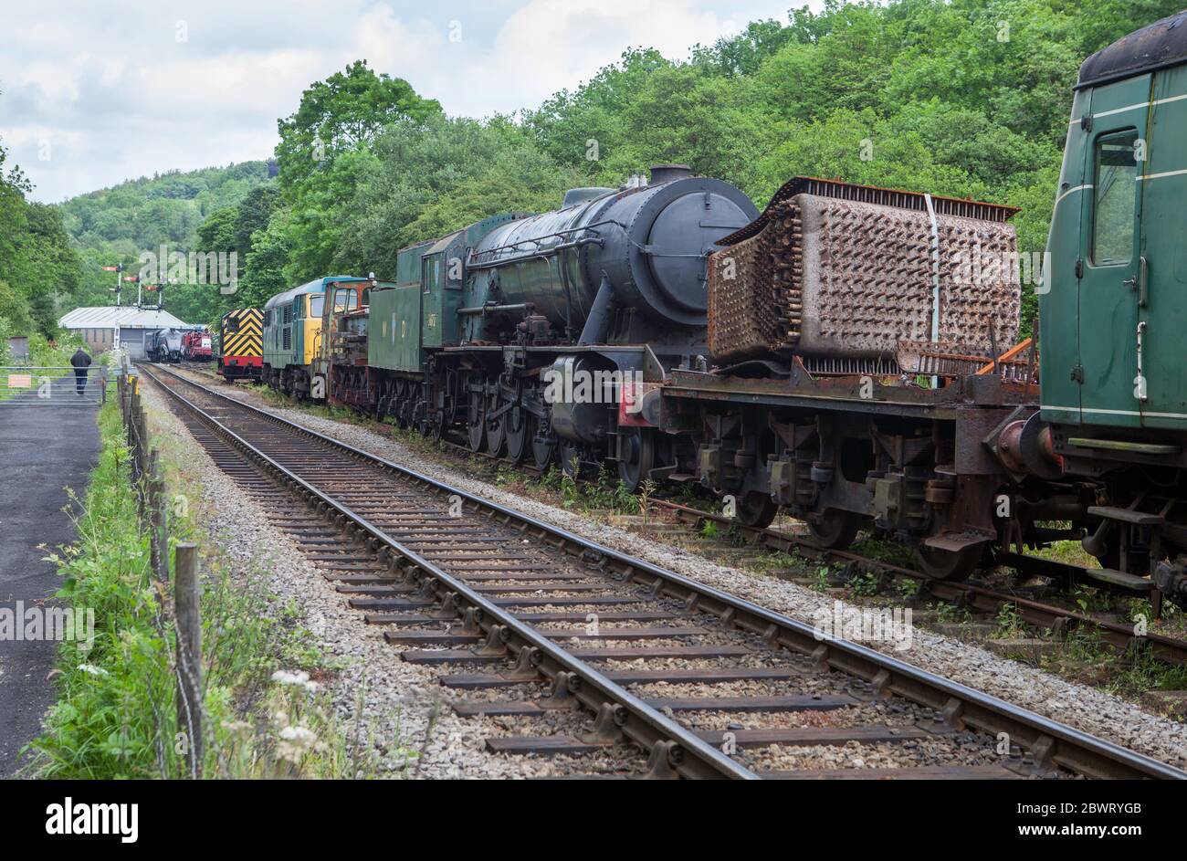 Storage siding with rolling stock awaiting repair and restoration on the North York Moors Railway near Grosmont, North Yorkshire Stock Photo