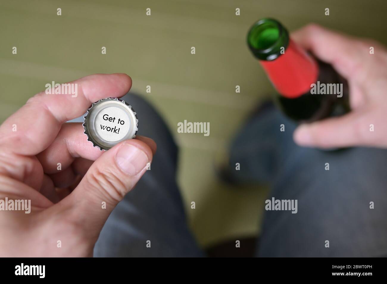 Inside of a bottle cap and the words, Get to work! Stock Photo