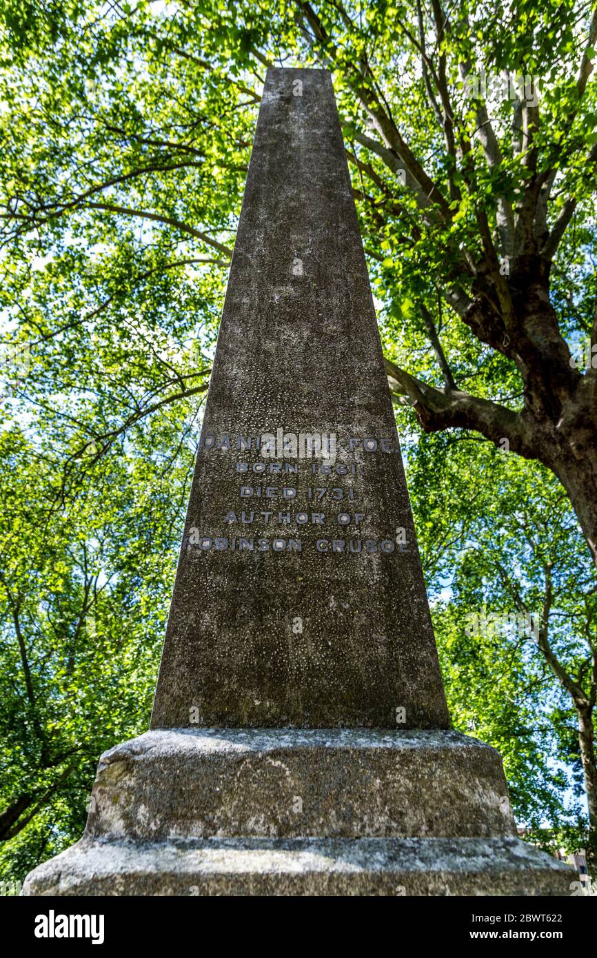 Obelisk at the grave site of Daniel Defoe, author of Robinson Crusoe, Bunhill Fields Burial Ground, London, UK Stock Photo