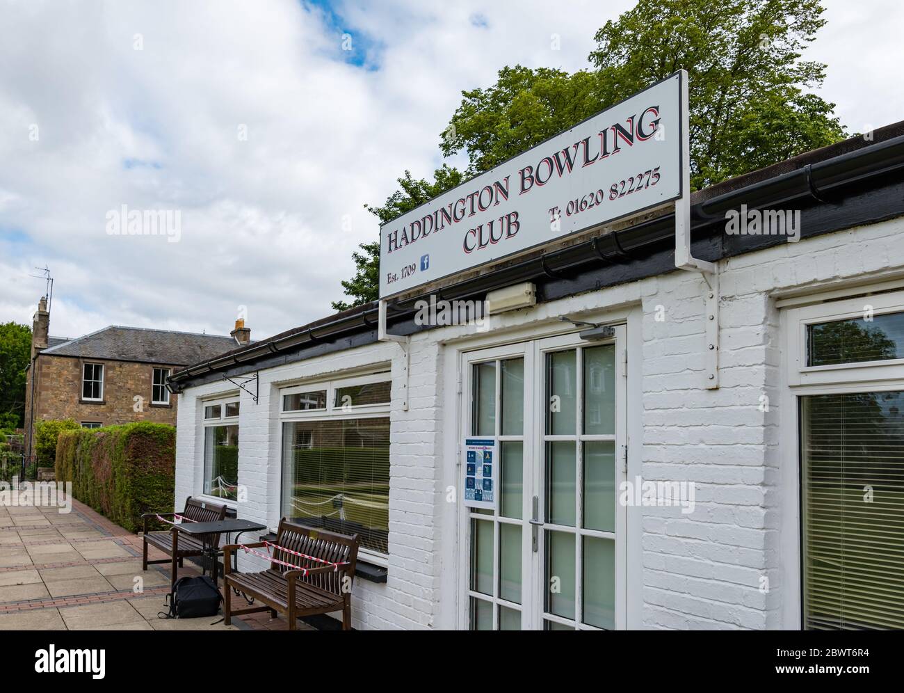 Haddington, East Lothian, Scotland, UK, 03 June 2020. Scotland's oldest bowling club prepares to reopen today after lockdown restrictions are eased with social distancing notices around the clubhouse Stock Photo