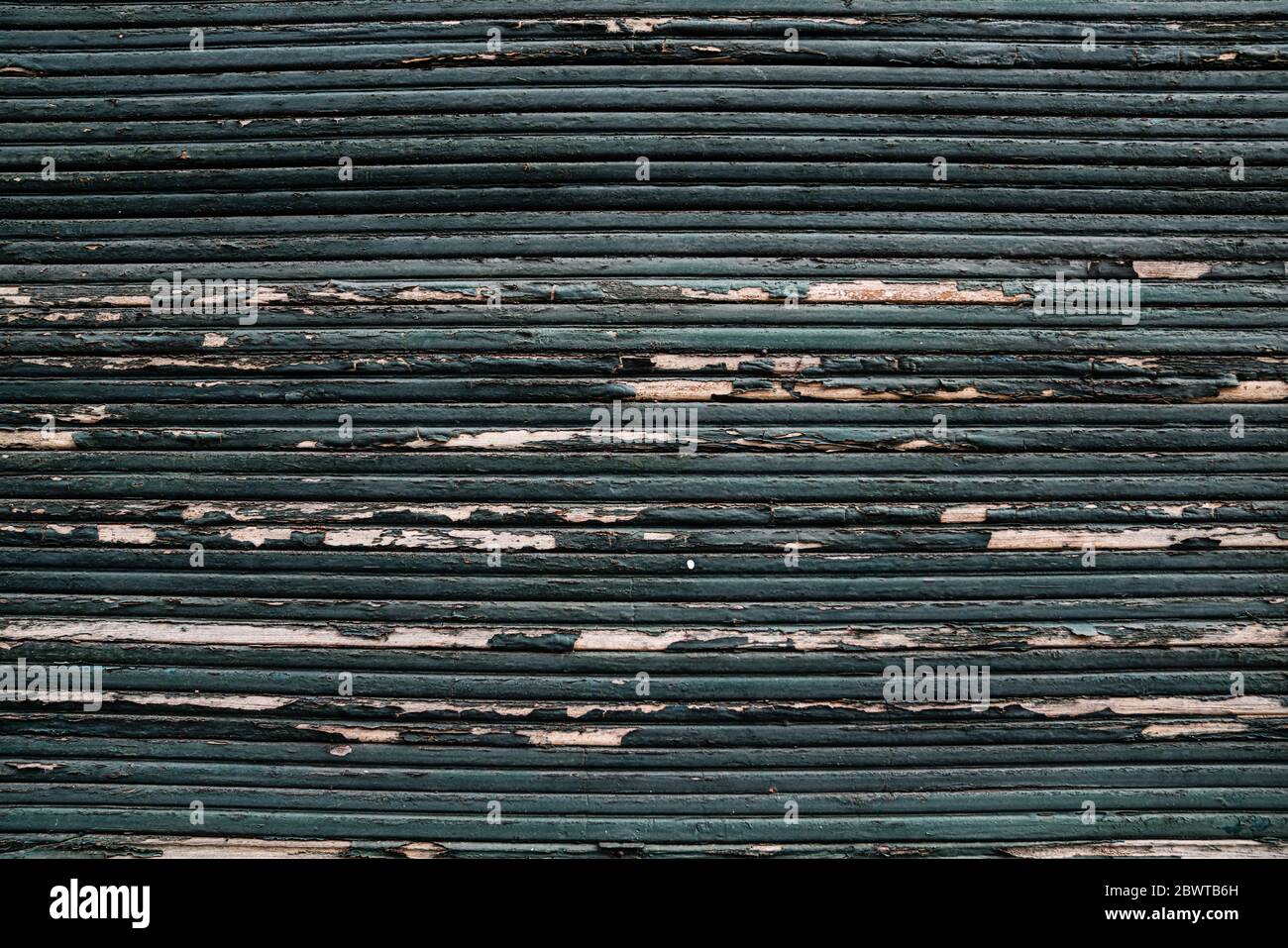 Patterns: Old Green Teal Window Shutter with Wooden Stripes Stock Photo
