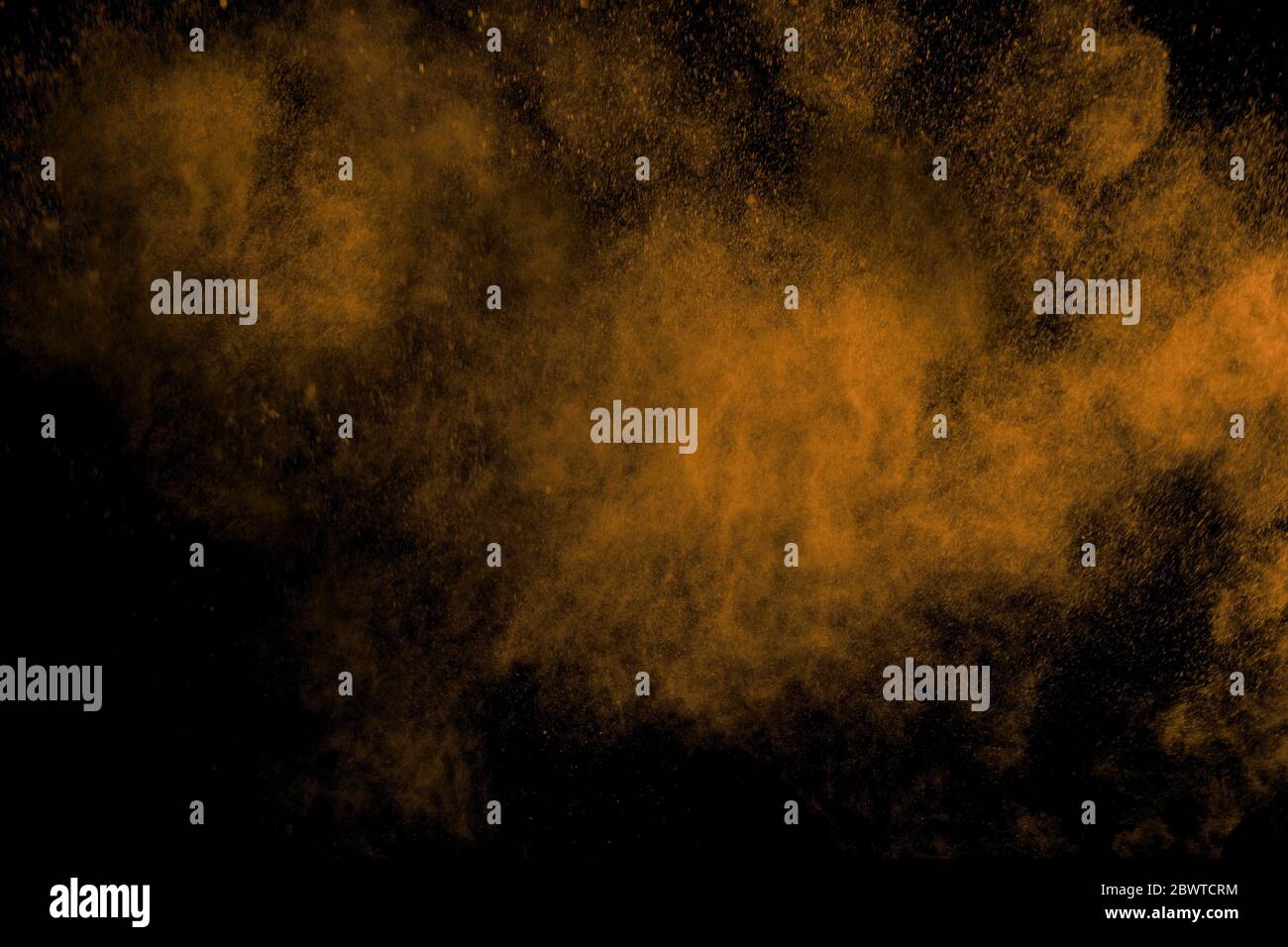 Abstract colored dust explosion on a black background.abstract powder ...