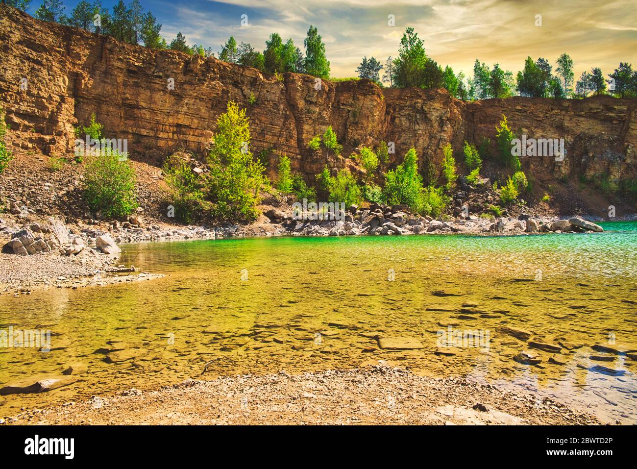 Azure lake. The concept of landscape and relaxing in the fresh air. Trukus water reservoir, attraction and a beautiful place to spend free time. Beaut Stock Photo