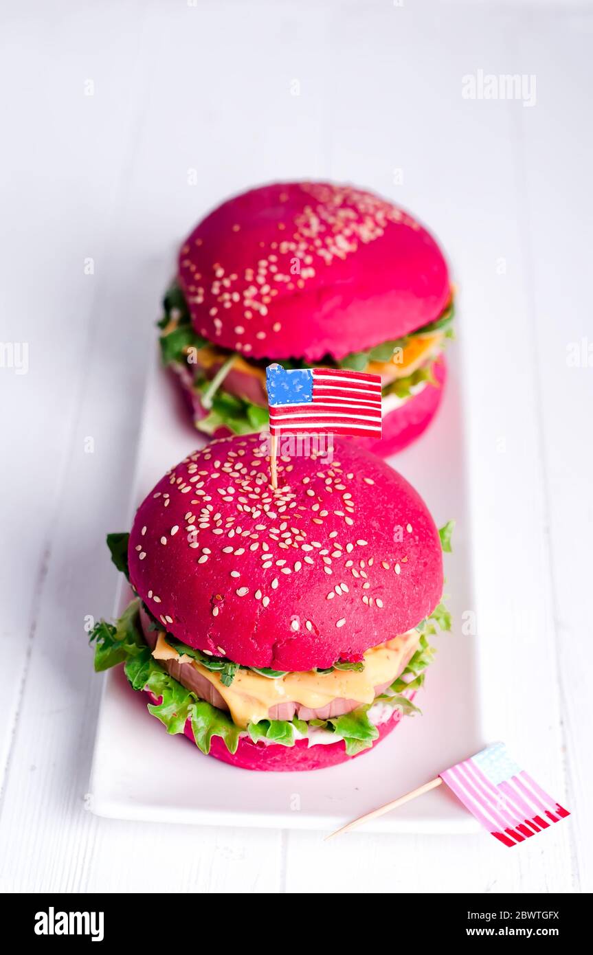 American grilled hamburger with USA flag. 4th of July. Independence day. Stock Photo