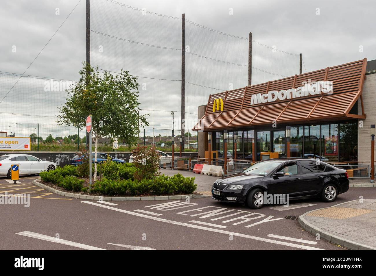 Cork, Ireland. 3rd June, 2020. McDonald's Drive-Thru reopened at 11am this morning after being closed for over 2 months due to the Covid-19 Pandemic. There were big queues of cars waiting to be served at the fast food restaurant. Credit: AG News/Alamy Live News Stock Photo