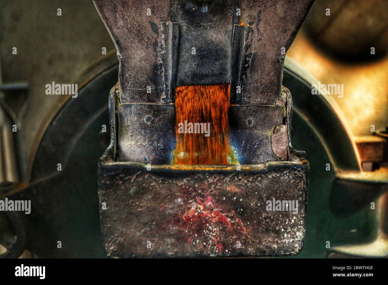 Kathmandu, Nepal. 3rd June, 2020. Turmeric powder is pictured as it come out from a grinding machine at a mill during nationwide lockdown amid COVID-19 outbreak in Kathmandu, capital of Nepal on June 3, 2020. Credit: Sunil Sharma/ZUMA Wire/Alamy Live News Stock Photo