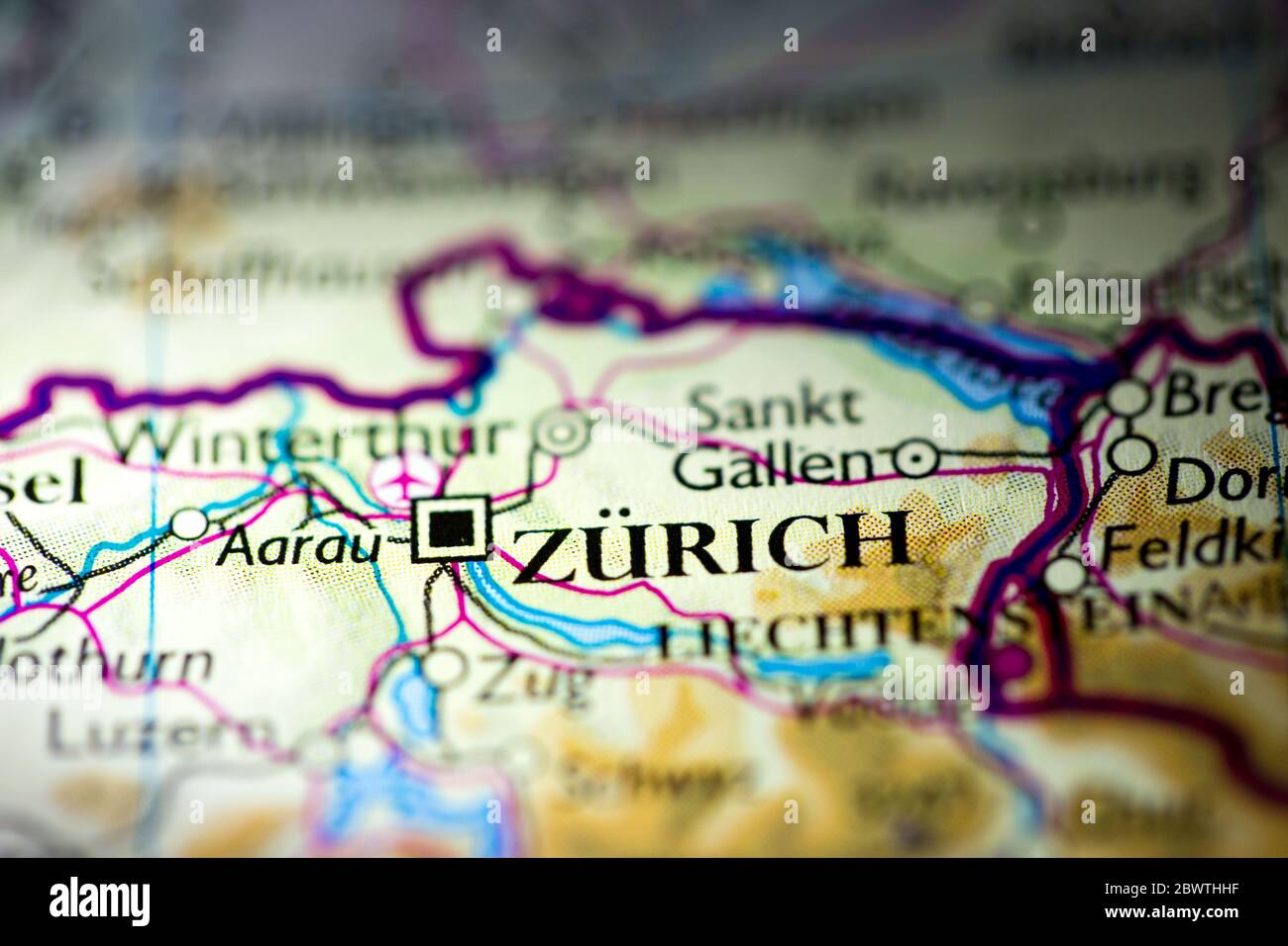 Shallow depth of field focus on geographical map location of Zurich city Switzerland Europe