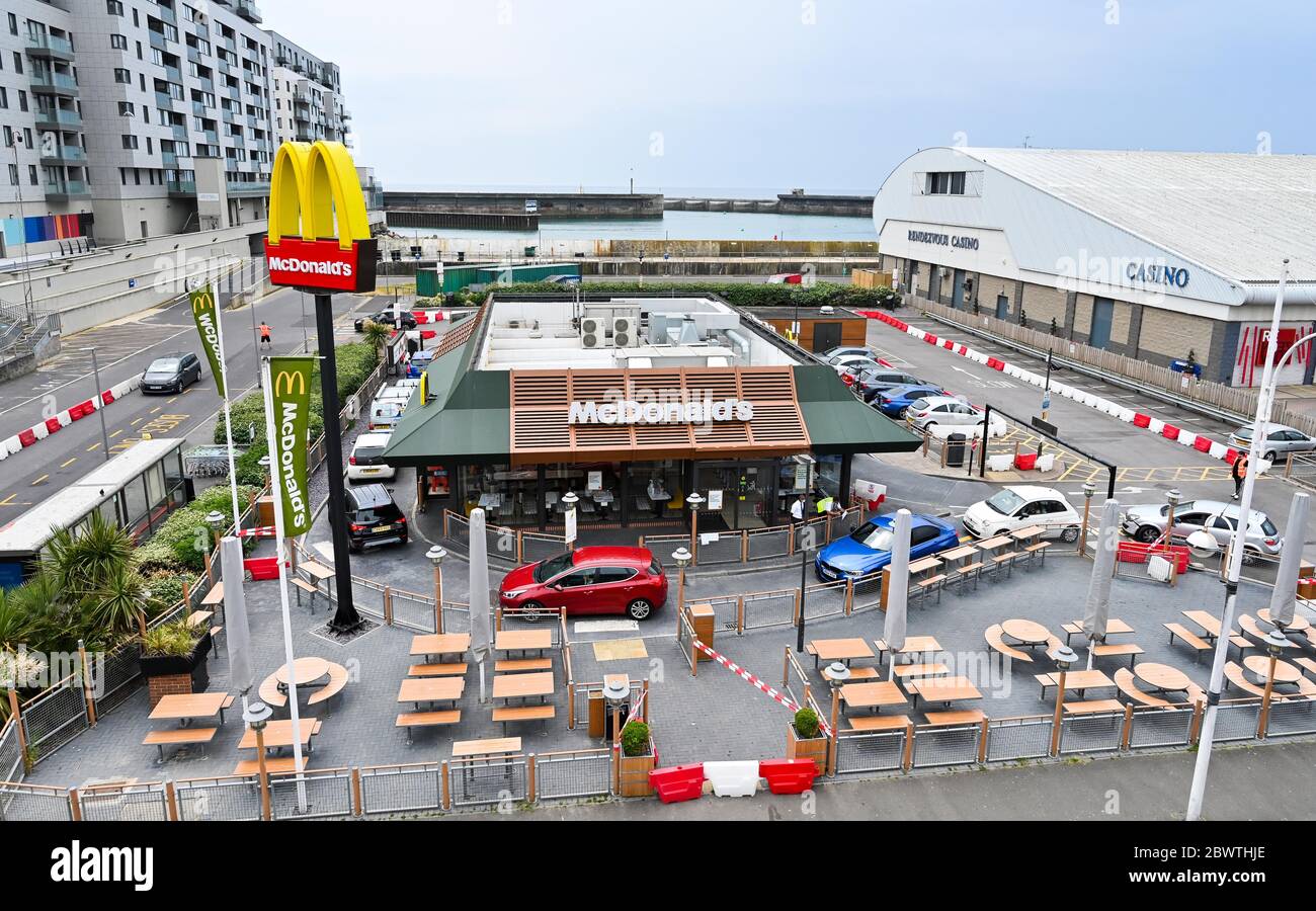 Brighton UK 3rd June 2020 - The McDonald's Drive Thru restaurant in Brighton Marina after reopening today where they are operating a traffic management system to keep the queues down : Credit Simon Dack / Alamy Live News Stock Photo