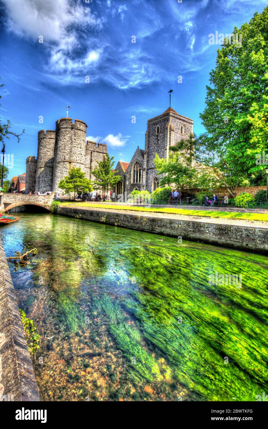 City of Canterbury, England. Artistic view of the Medieval Westgate towers with the Great Stour in the foreground. The 14th century tower is Grade I l Stock Photo