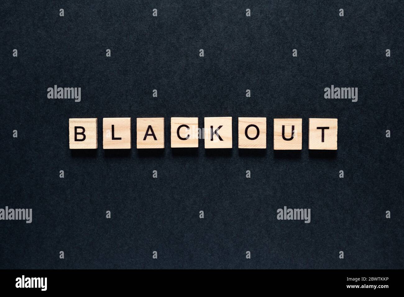 Blackout inscription on a black background. Black lives matter