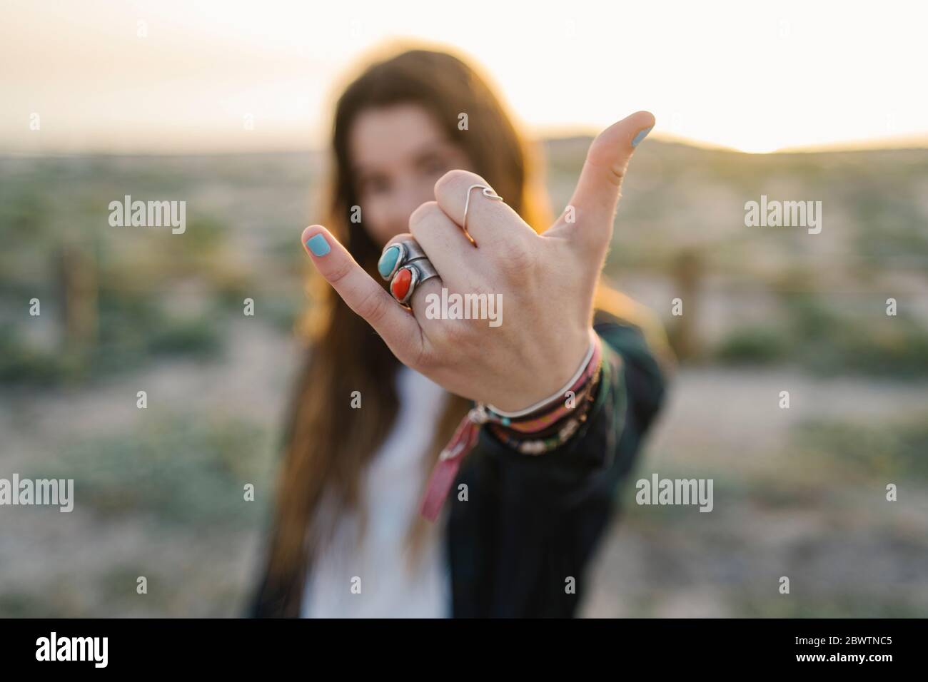 Hand of woman showing shaka sign, close-up Stock Photo