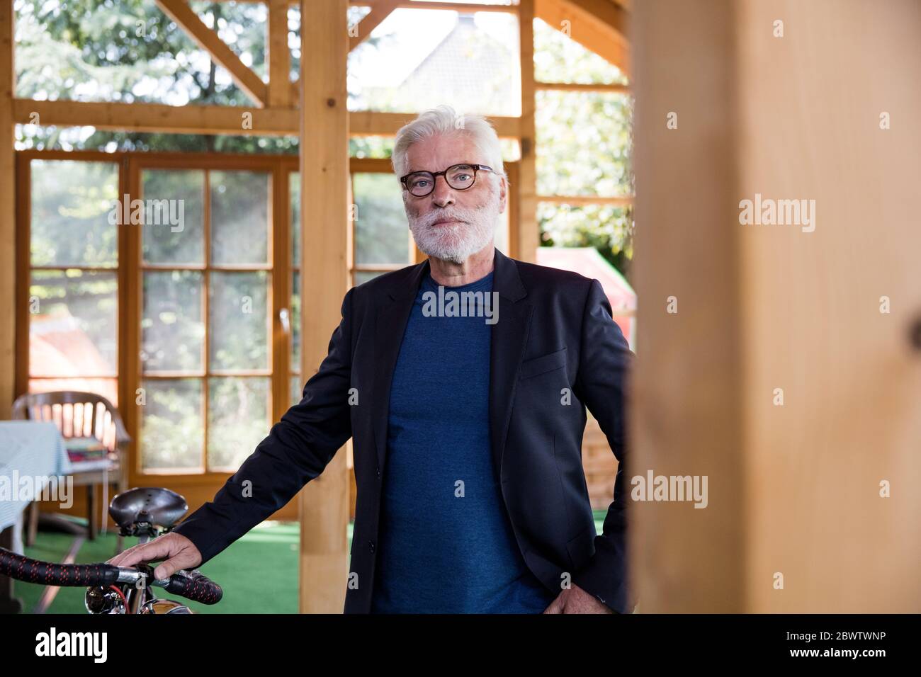 Bearded Men Racing Portrait of bearded senior man with racing cycle in a shelter Stock ...