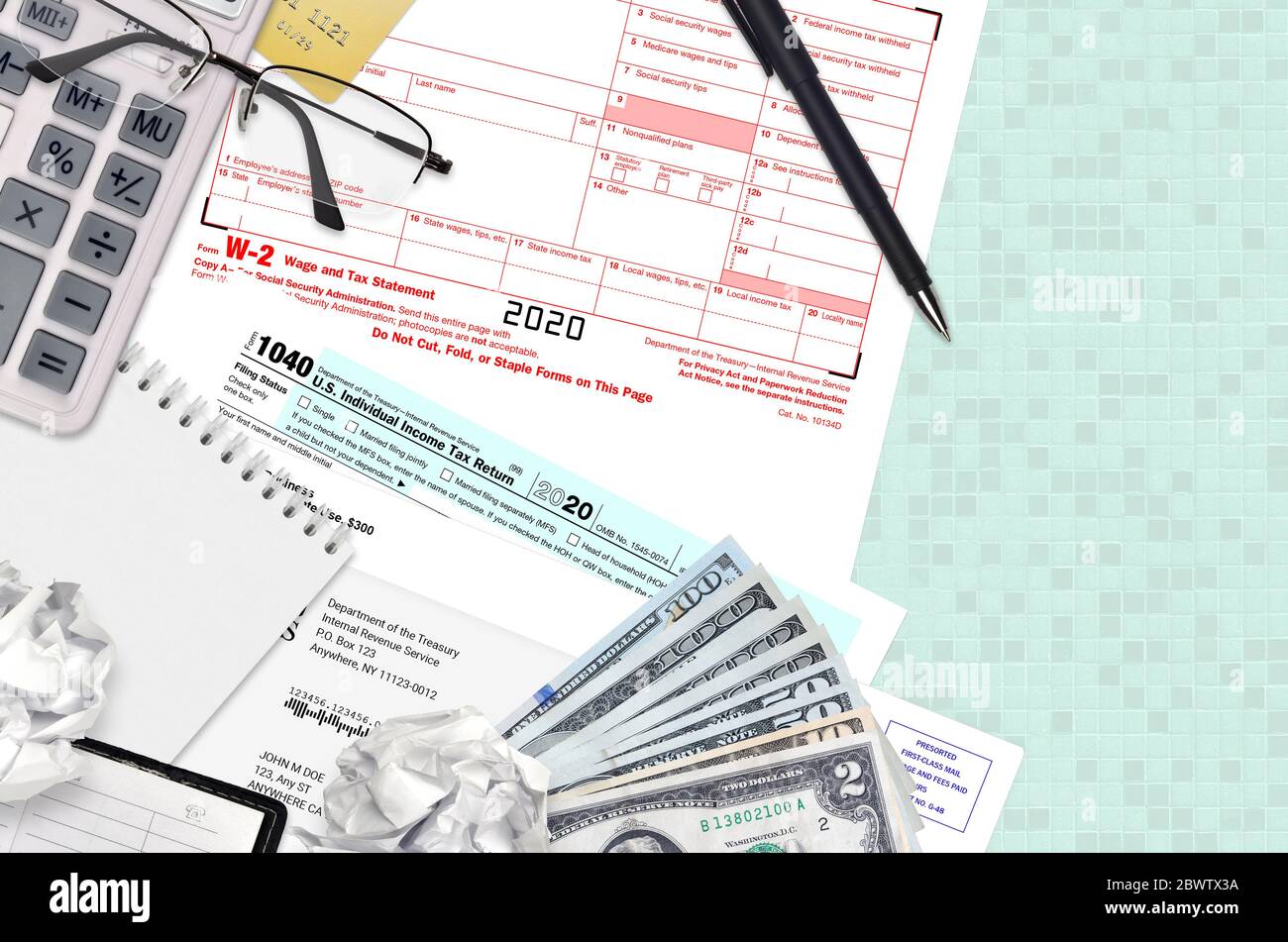 Irs Form 1040 Individual Income Tax Return And W 2 Wage And Tax Statement Lies On Office Table 1301