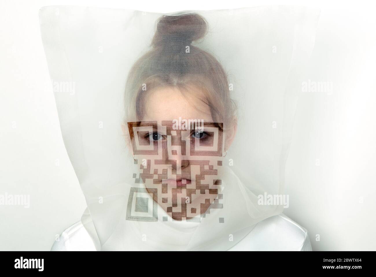 Portrait of teenage girl wearing transparent mask with QR Code Stock ...