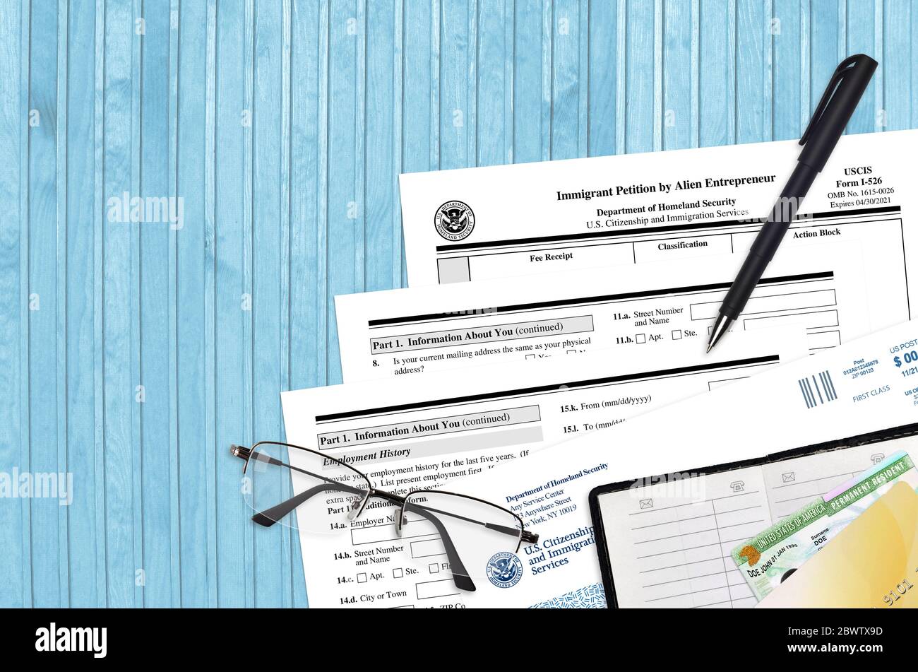 USCIS form I-586 Immigrant petition by Alien Entrepreneur lies on flat lay  office table and ready to fill. U.S. Citizenship and Immigration services p  Stock Photo - Alamy