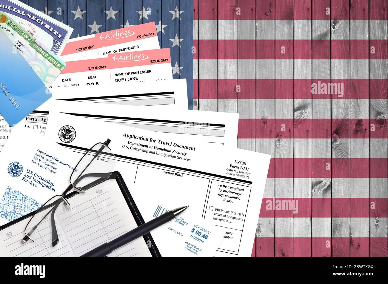 USCIS form I131 Application for travel document lies on flat lay office table and ready to fill