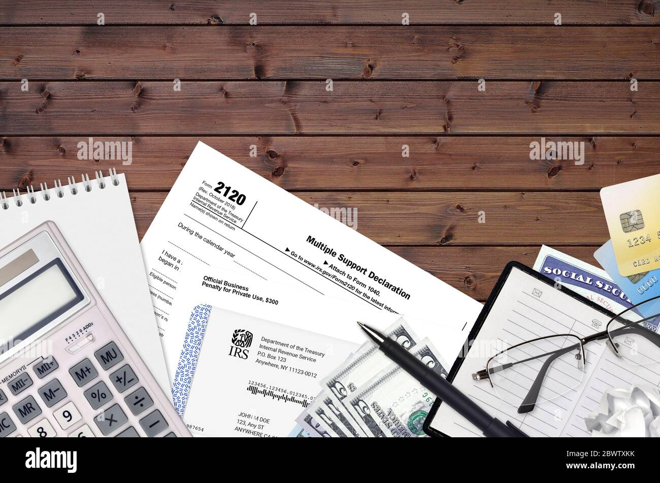 Tax papers with pen and calculator hi-res stock photography and images -  Page 10 - Alamy