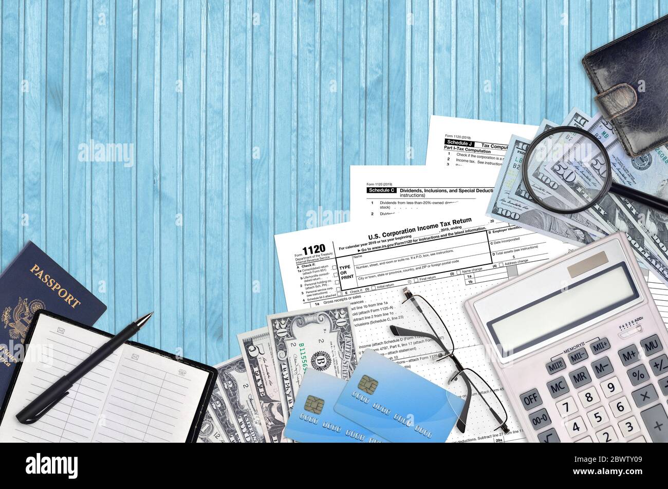 IRS form 1120 U.S. Corporation income tax return lies on flat lay ...