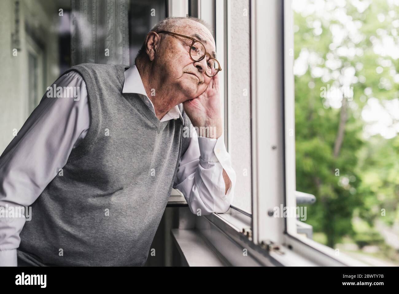 An Elderly Man Looks Out Of Window With Old Window Background, Show Me A  Picture Of The Man From The Window Background Image And Wallpaper for Free  Download