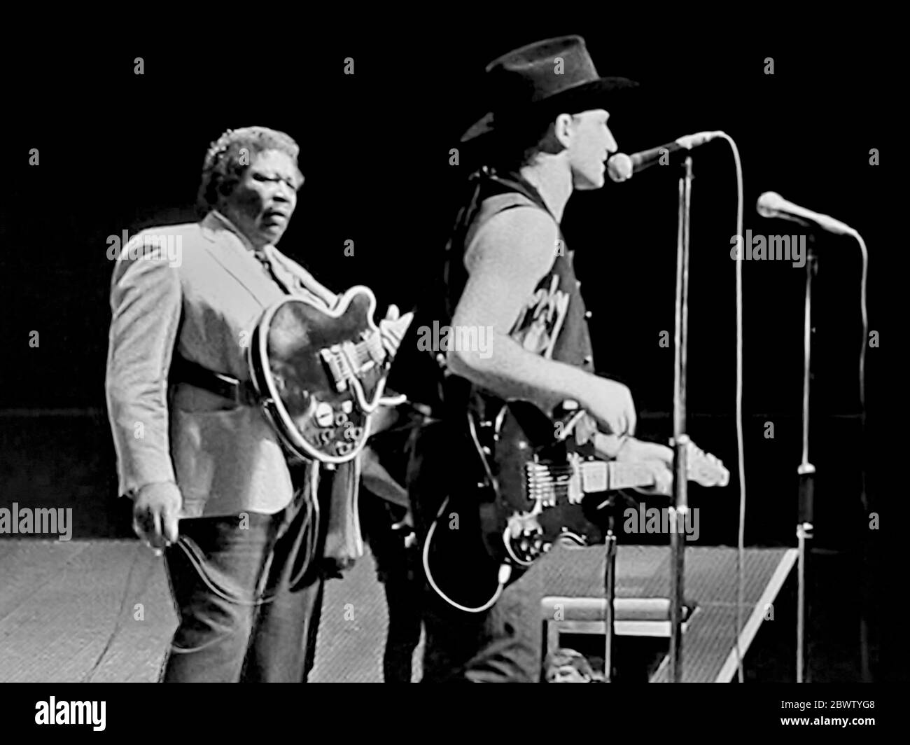 The rock band U2 and BB King featuring plaing 'When Love Comes to Town' from U2's 1988 album, Rattle and Hum Stock Photo