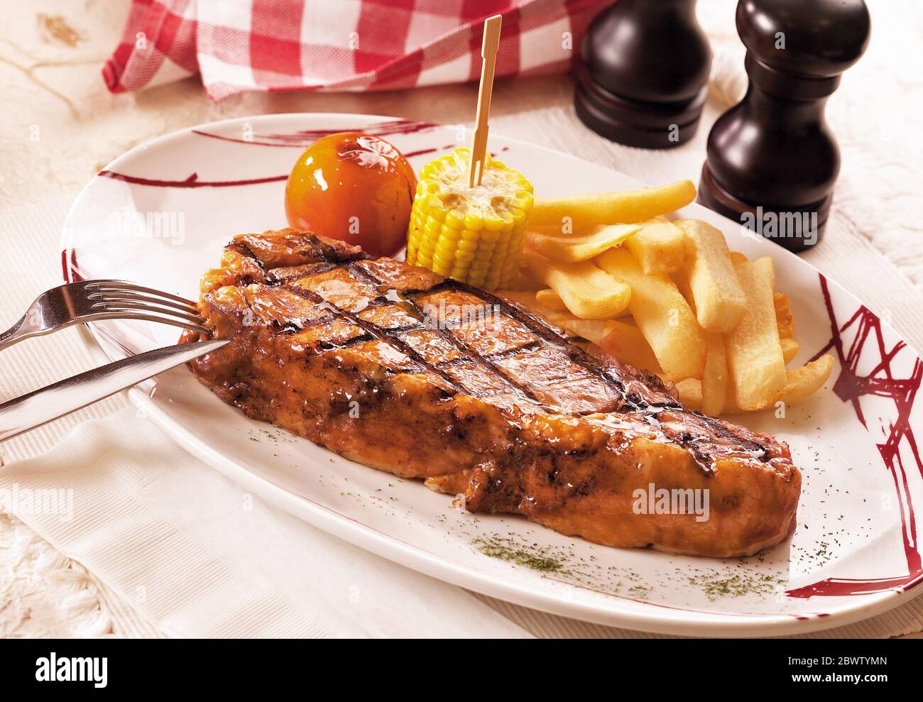 Grilled beef steak with french fries Stock Photo Alamy