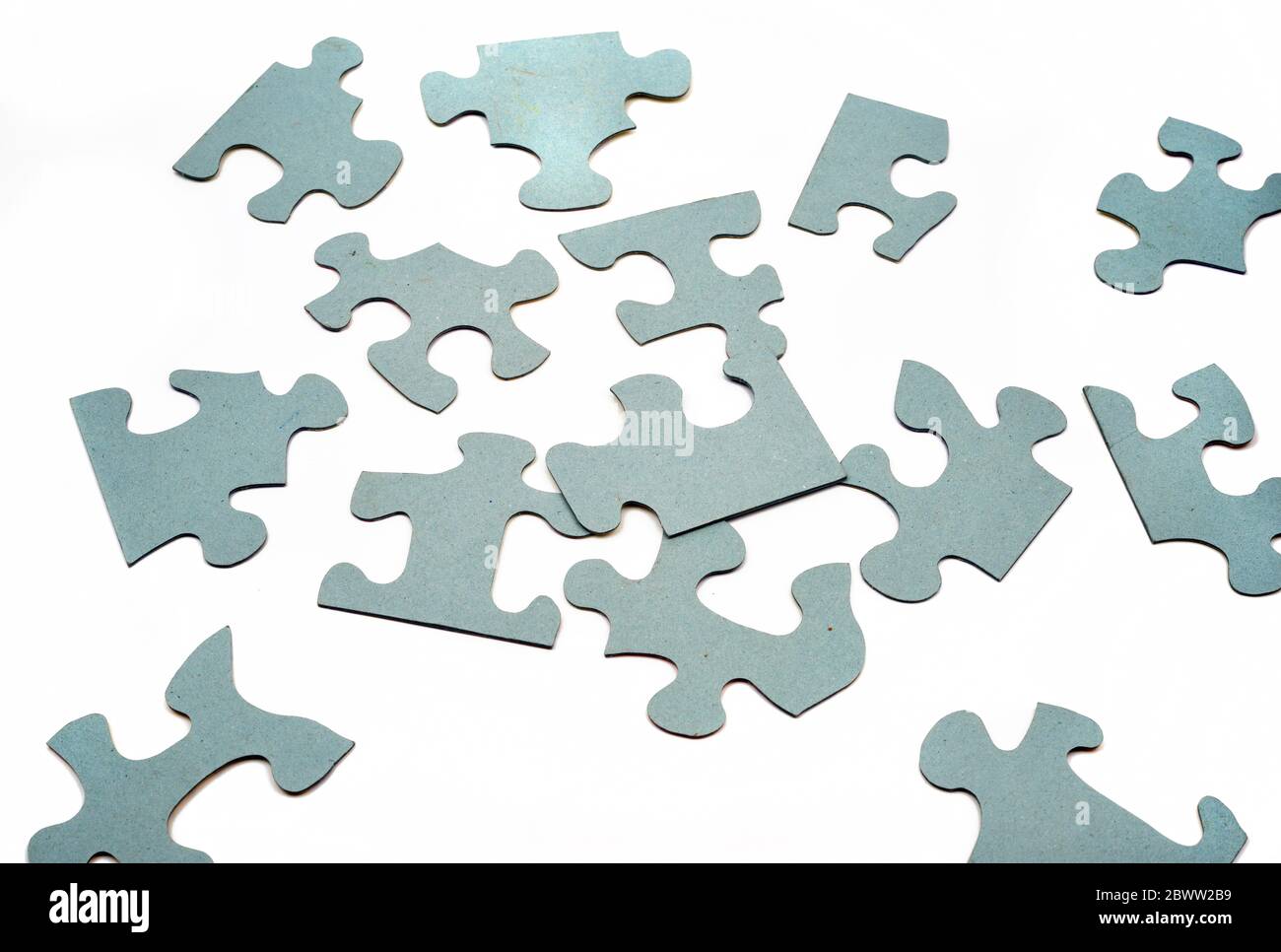 Puzzle isolated on white background blue grey pieces Stock Photo - Alamy