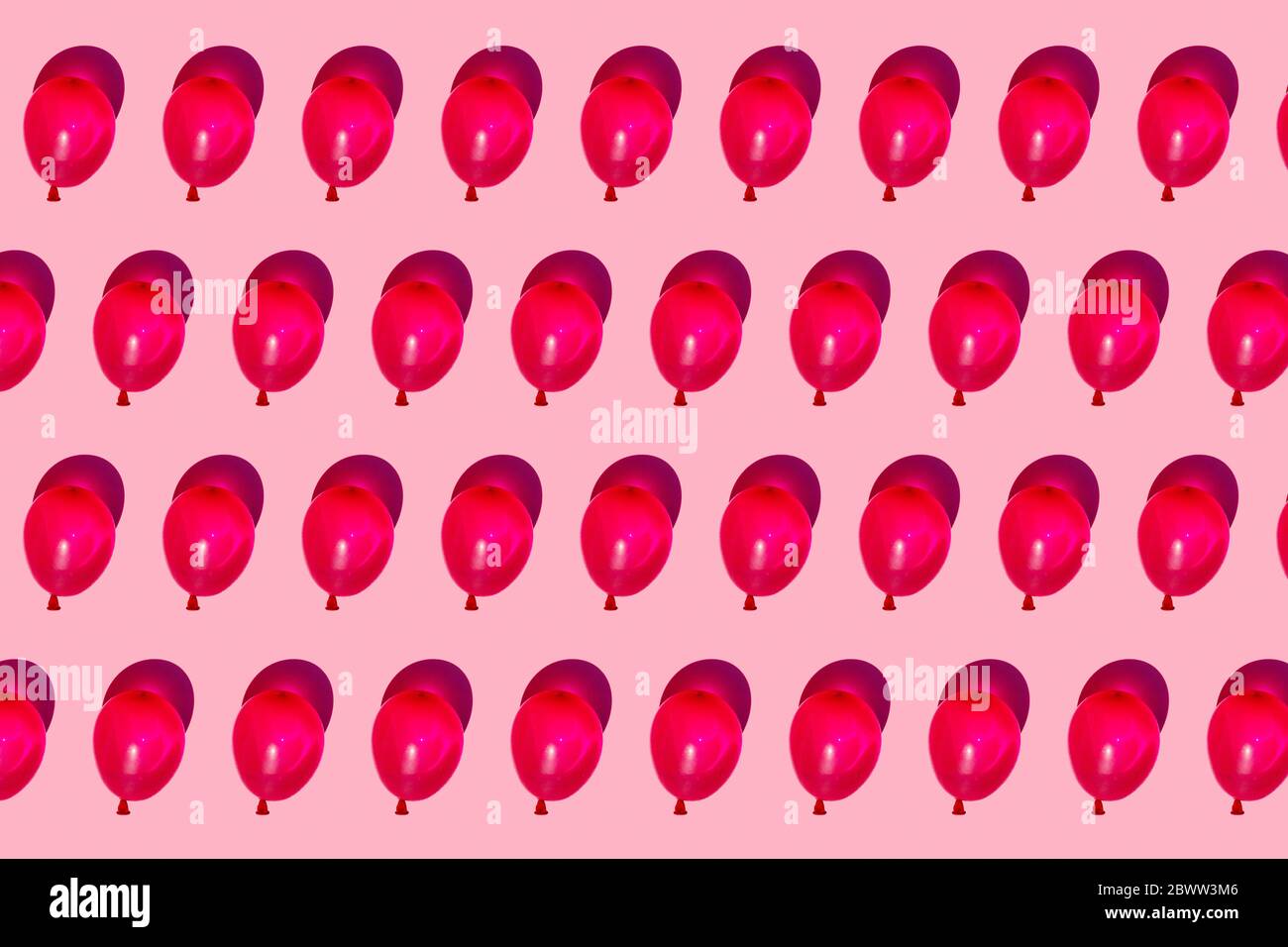 Pattern of rows of red water balloons Stock Photo - Alamy
