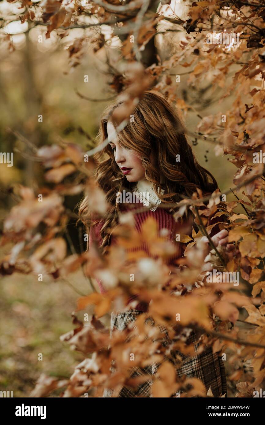 Fashionable woman in autumnal nature Stock Photo