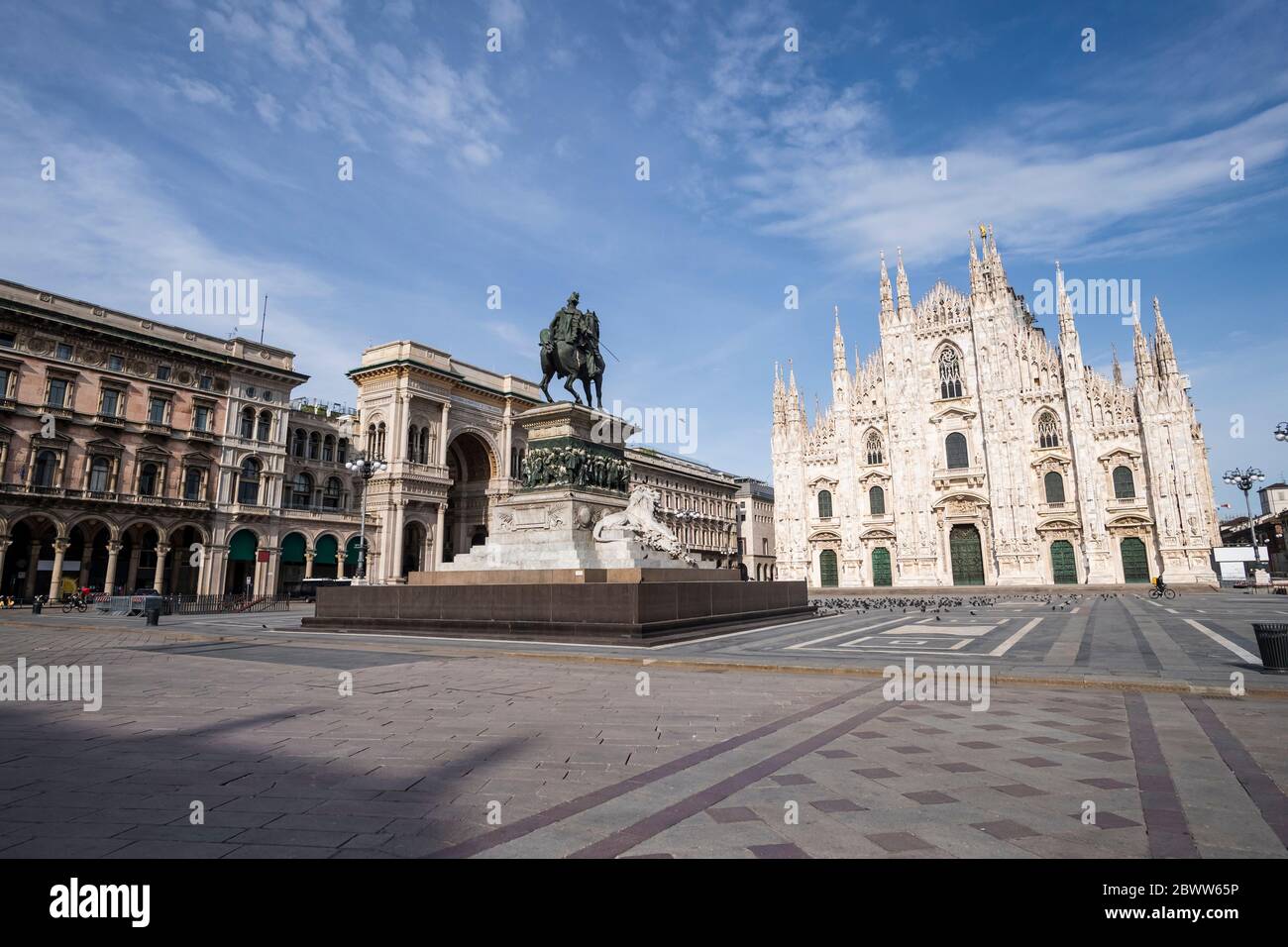 Italy, Milan, Monument to Victor Emmanuel II standing at empty Piazza del Duomo during COVID-19 outbreak Stock Photo