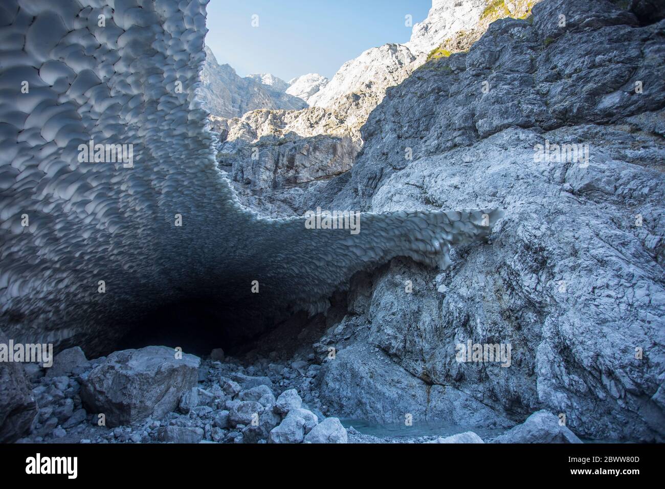 Germany, Bavaria, Berchtesgaden, Cave in Eiskapelle snowfield Stock Photo