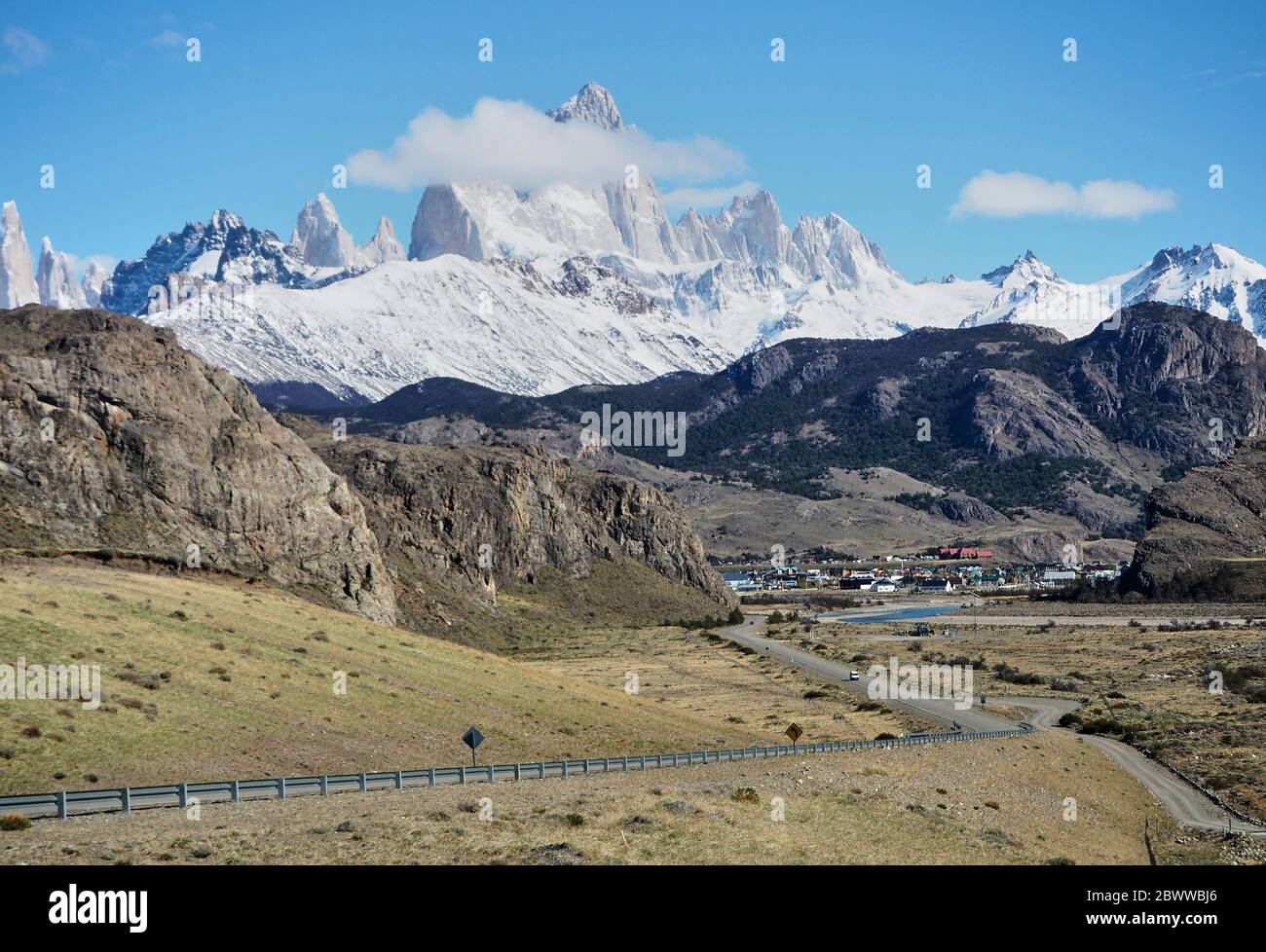 El Chalten near Cerro Torre and Fitz Roy's mountains against sky, El Chalten, Argentina Stock Photo