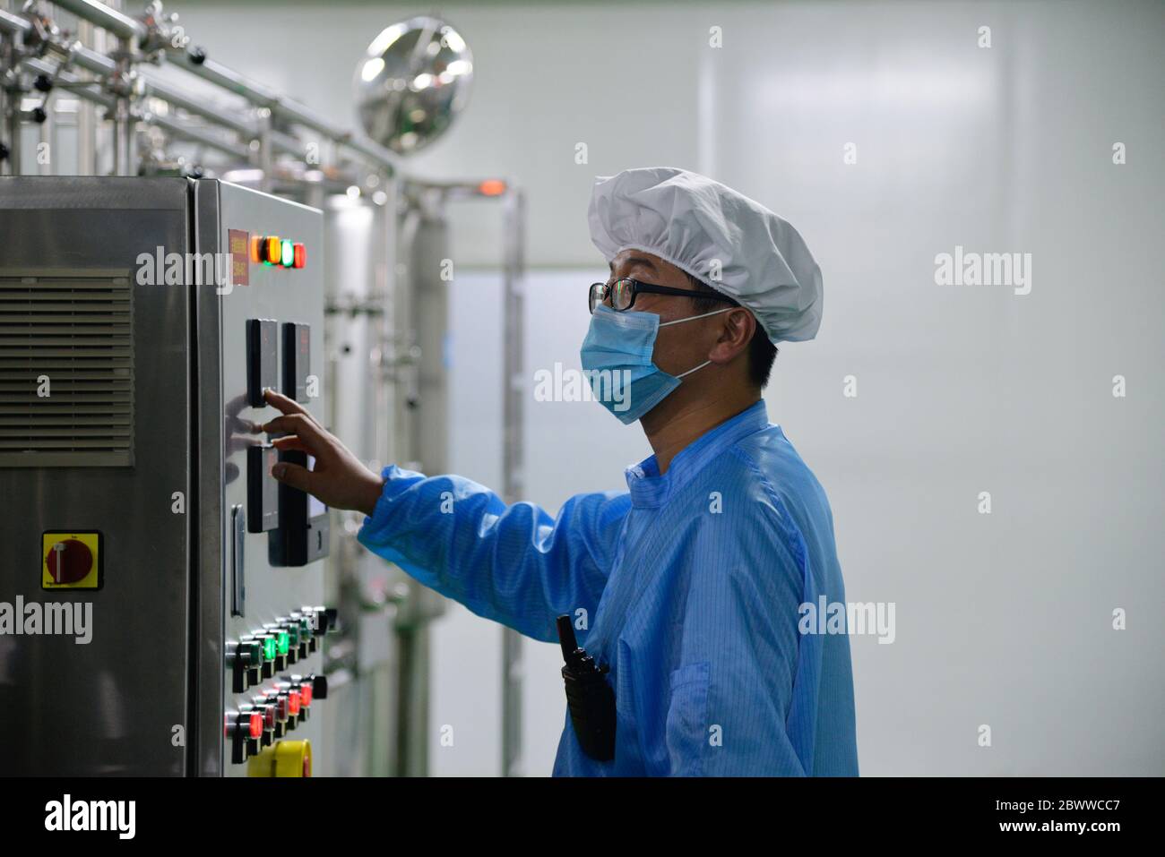 Alxa, China's Inner Mongolia Autonomous Region. 3rd June, 2020. A worker works on the production line of camel milk at the workshop of a company in Alxa Right Banner, north China's Inner Mongolia Autonomous Region, June 3, 2020. The Alxa Right Banner has been promoting the development of camel industry in recent years with a series of supportive policies to help realize rural revitalization. Credit: Xu Qin/Xinhua/Alamy Live News Stock Photo