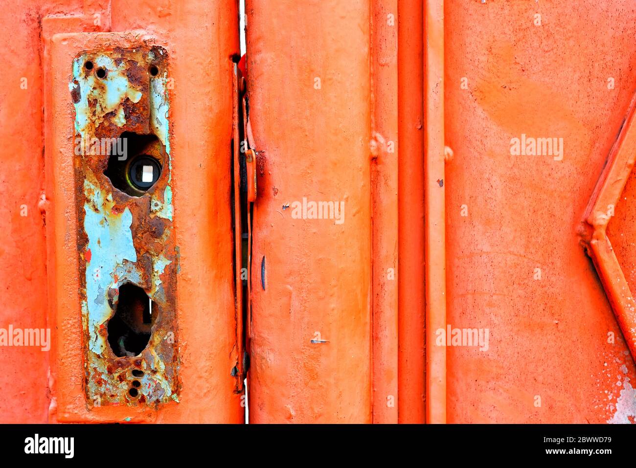 Broken Knob on Red Door. Stock Photo
