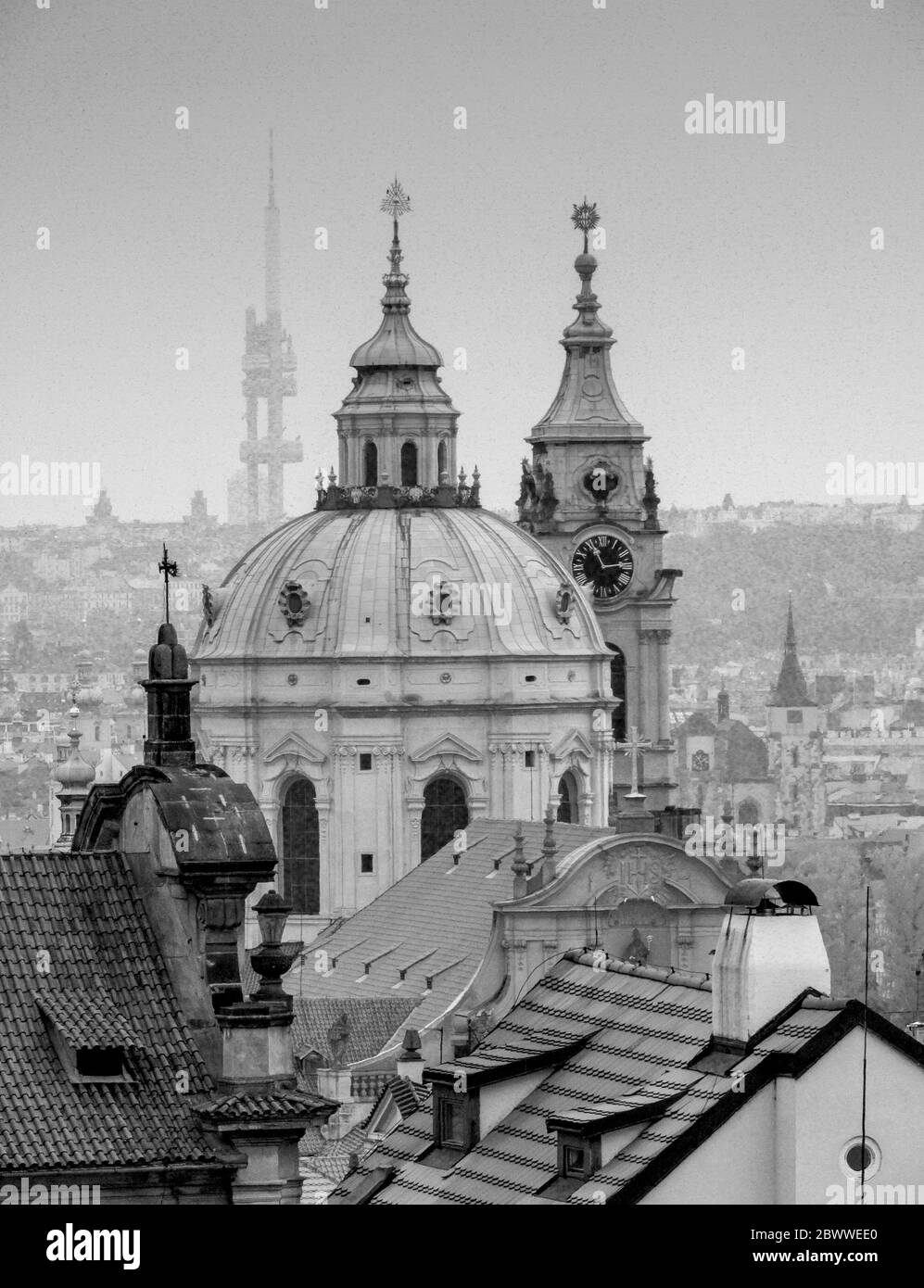 Church Of St. Nicholas from the Prague Castle - Pra?sk? Hrad with the city skyline. The Baroque church was built between 1704-1755. Czech Republic. Stock Photo