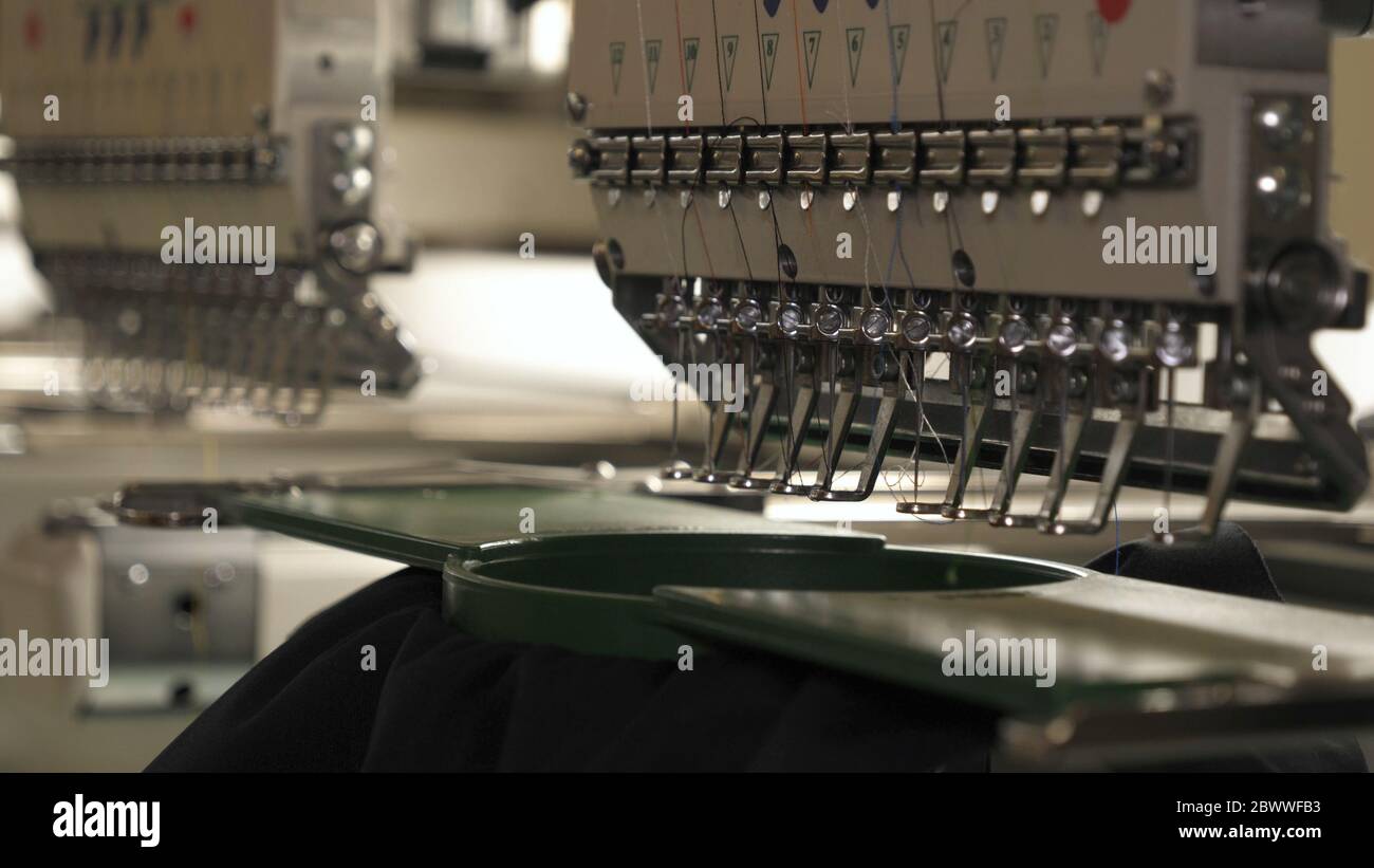 Industrial garment factory, an automatic sewing machine sews various strips on fabric offline