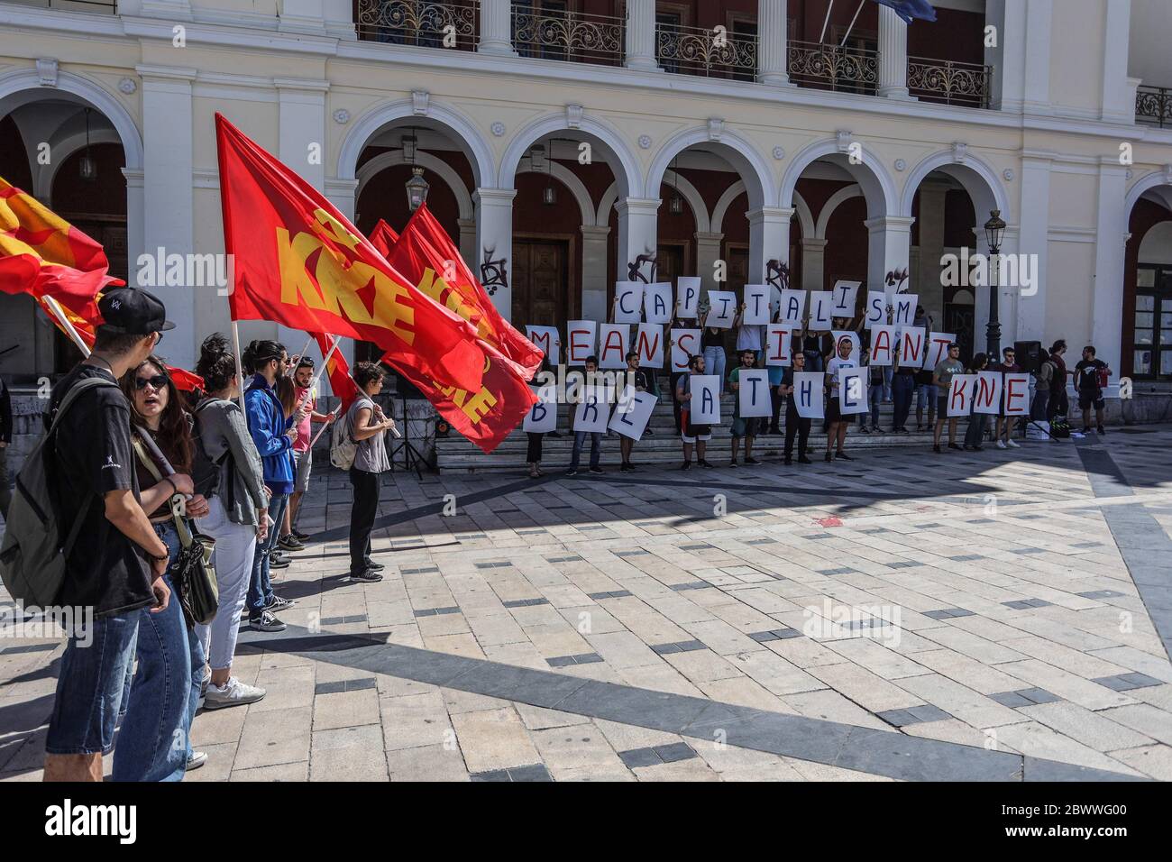Patras Greece 03rd June 2020 Communist Youth Are Seen Holding Placards Forming A Message Reading Capitalism Means I Can T Breath While Their Fellow Youth Are Seen Holding Communist Flags During The George