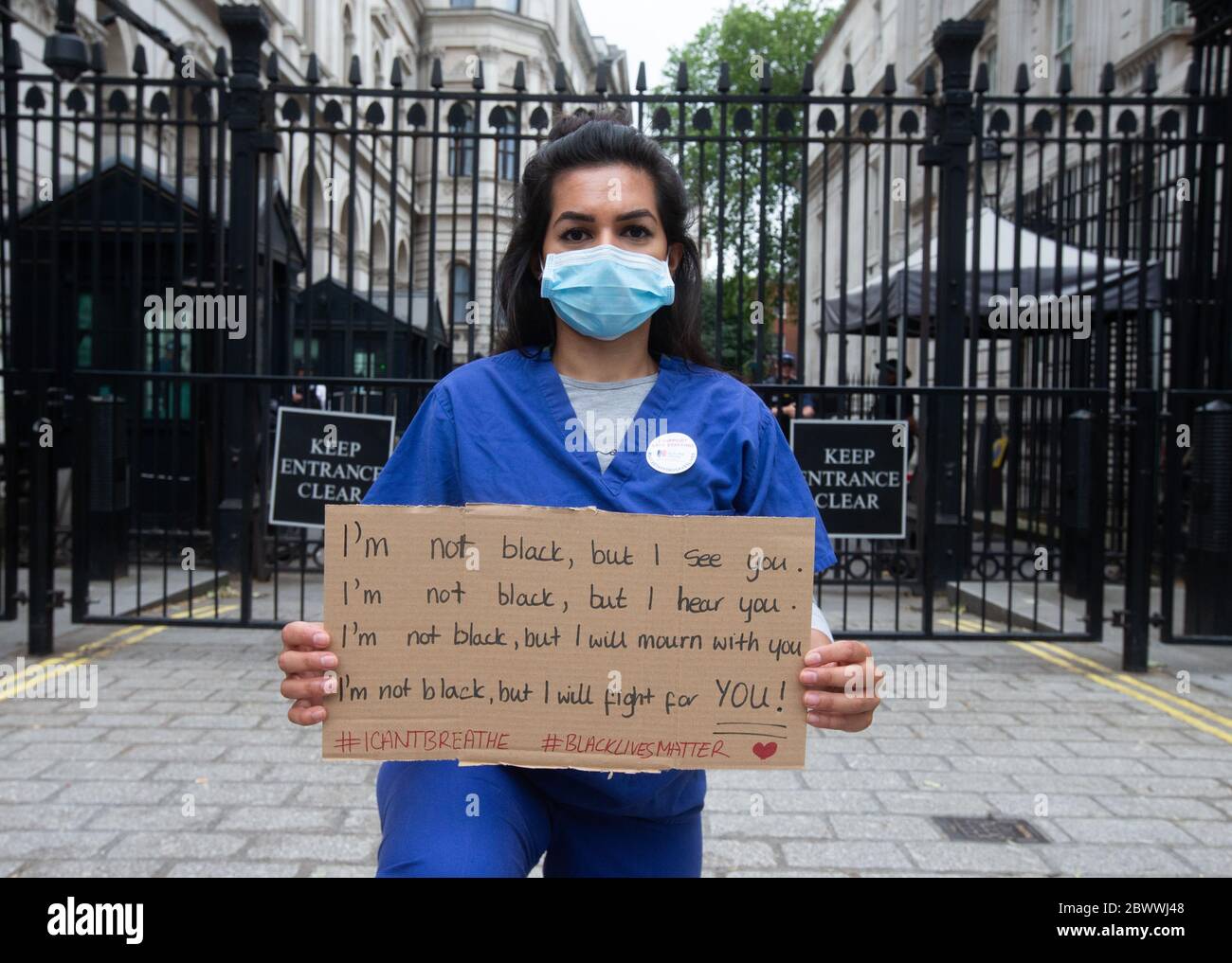 London, UK. 3rd June, 2020. Nurse Ameera Sheikh shows her support for the 'Black lives matters' campaign. NHS workers demonstrate at the gates of Downing Street. The are asking the Government for better pay. They are also showing support for the 'Black lives matter' campaign. Credit: Tommy London/Alamy Live News Stock Photo
