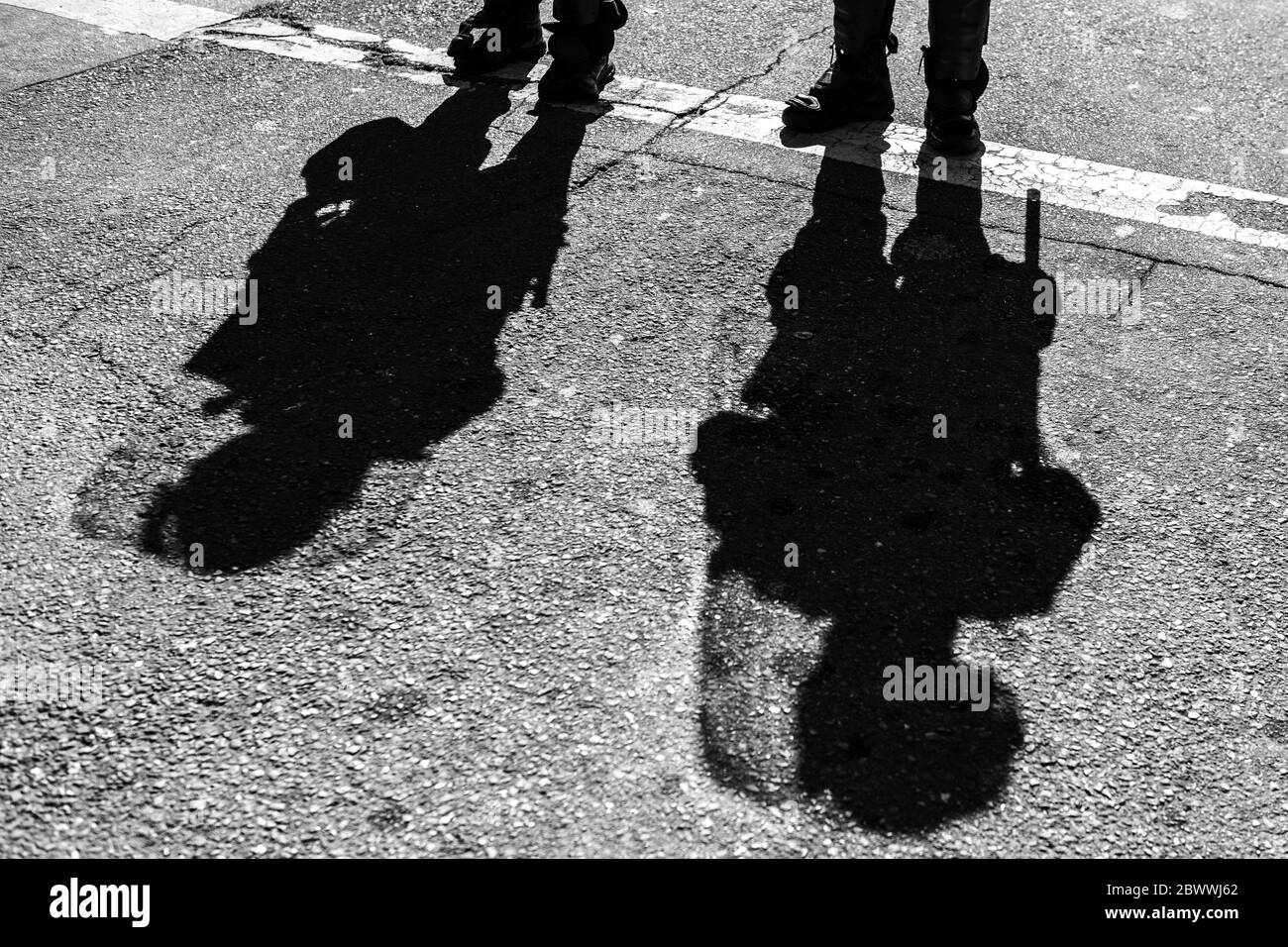 Oakland, Ca. 2nd June, 2020. Police Officers cast shadows near the Oakland Police Department in Oakland, California on June 2, 2020 after the death of George Floyd. Credit: Chris Tuite/Image Space/Media Punch/Alamy Live News Stock Photo