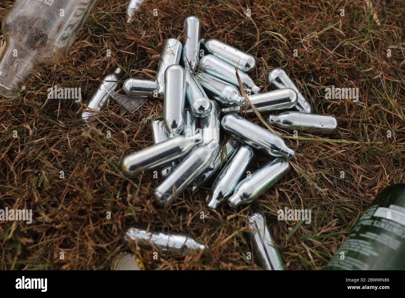 Discard Canisters of nitrous oxide or 'hippie crack' in the Clondalkin area of Dublin. Stock Photo